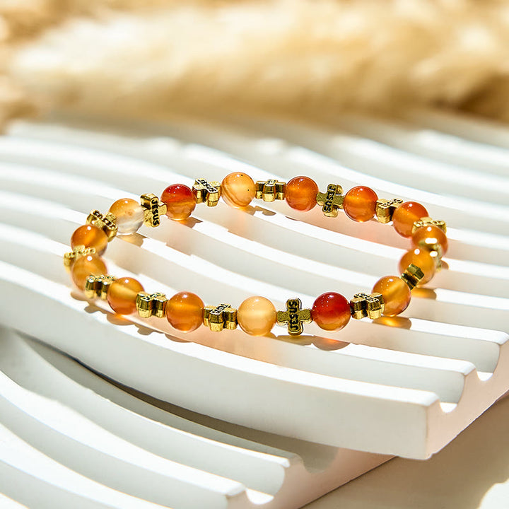 Olivenorma Bracciale con perline a croce in metallo argentato e agata rossa naturale 