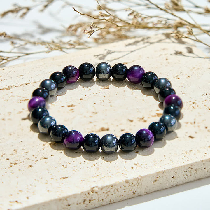 Bracciale Olivenorma con perline in ossidiana ematite viola occhio di tigre