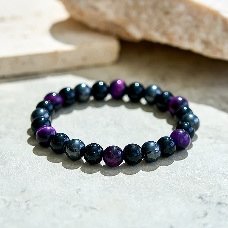 Bracciale Olivenorma con perline in ossidiana ematite viola occhio di tigre