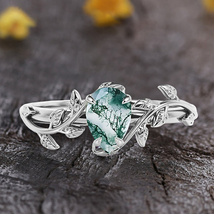 Anello di fidanzamento con foglia intrecciata in agata muschiata a taglio a pera Olivenorma