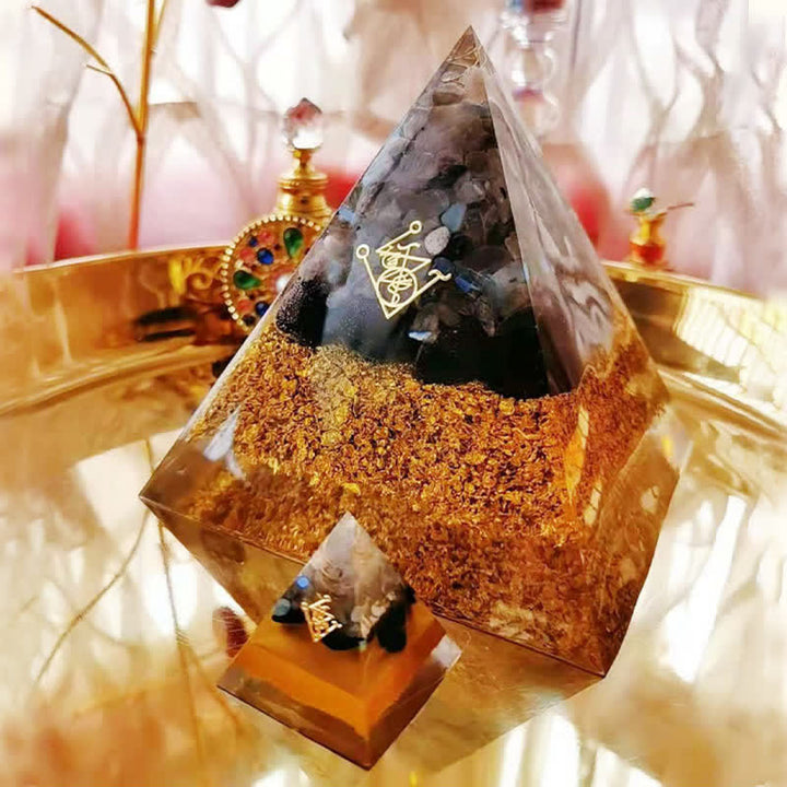 Piramide di orgone di ossidiana di cristallo trasparente di pietra di luna Olivenorma