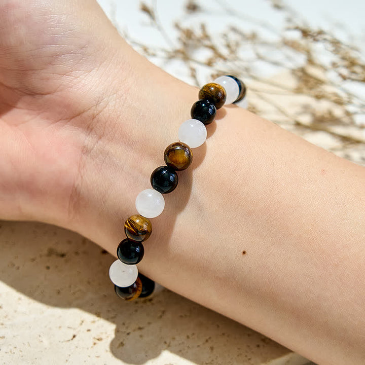 Bracciale Olivenorma con perline di cristallo trasparente in ossidiana e occhio di tigre