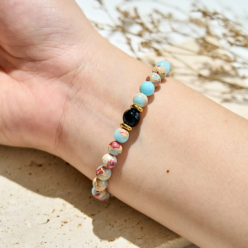 Bracciale Olivenorma in perle di ossidiana agalmatolite naturale