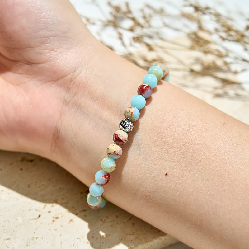 Bracciale Olivenorma in perle di quarzo fragola di agalmatolite naturale 