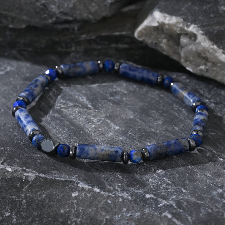 Bracciale Olivenorma con perline di sodalite blu e strisce di ematite naturale 