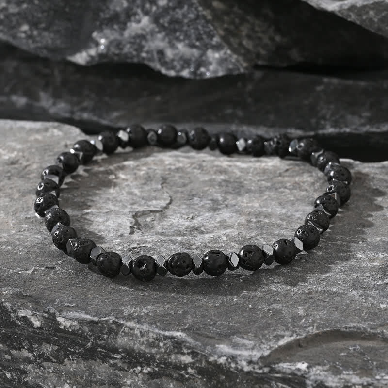 Bracciale Olivenorma in pietra lavica naturale ematite e perline turchesi 