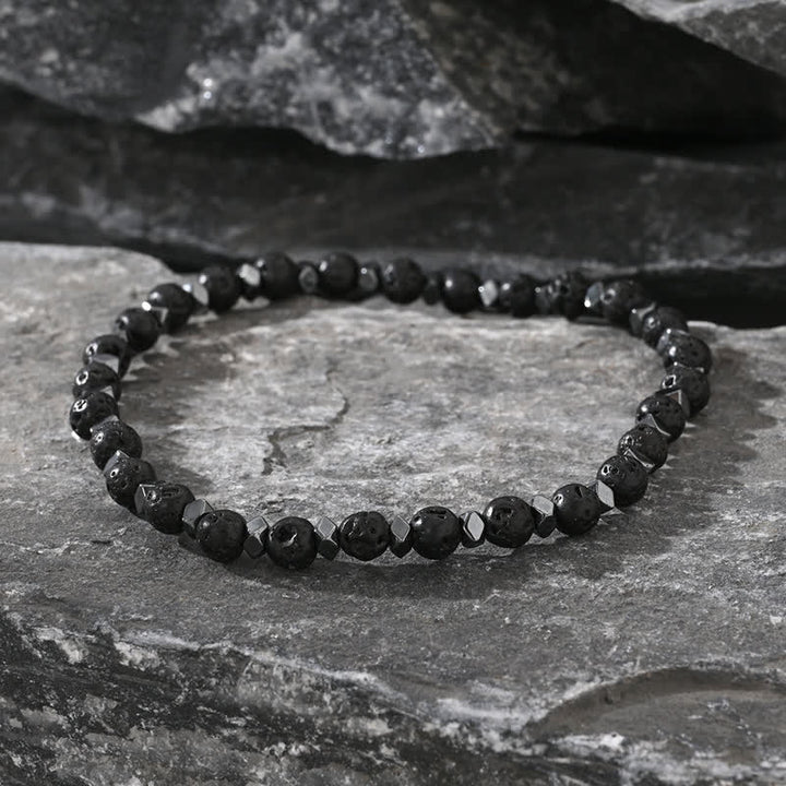 Bracciale Olivenorma in pietra lavica naturale ematite e perline turchesi 