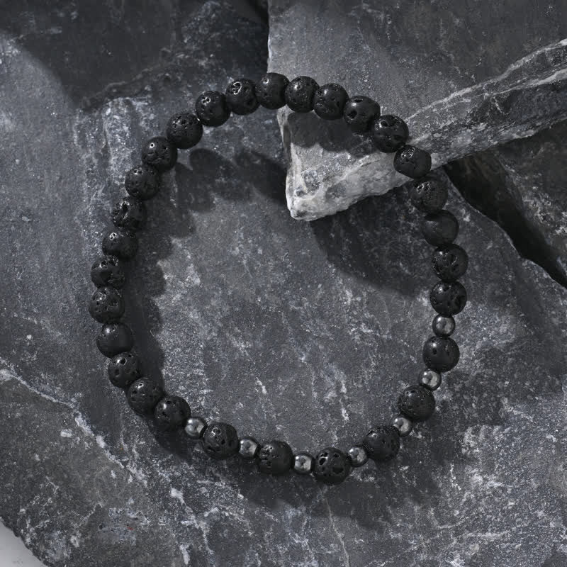 Olivenorma Bracciale con perline a croce in pietra lavica nera e bianca 