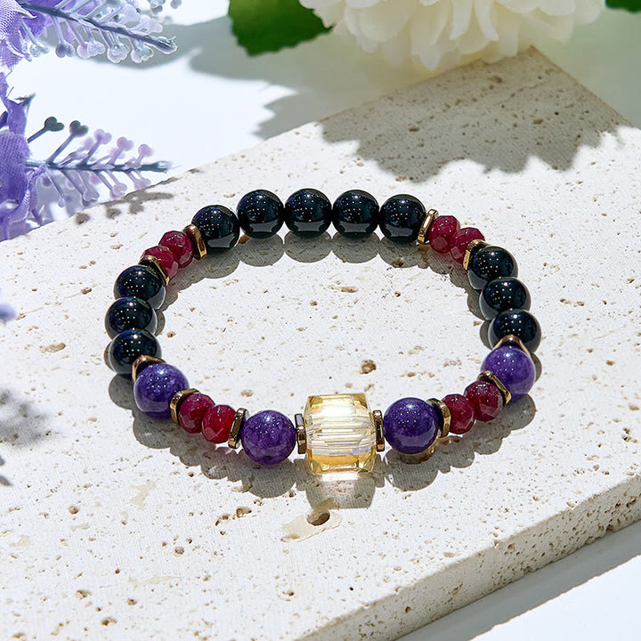 Bracciale elastico con portafortuna perline in pietra naturale Olivenorma 