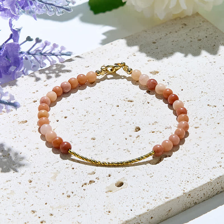Bracciale Olivenorma in perline di rodocrosite naturale da 2 mm 