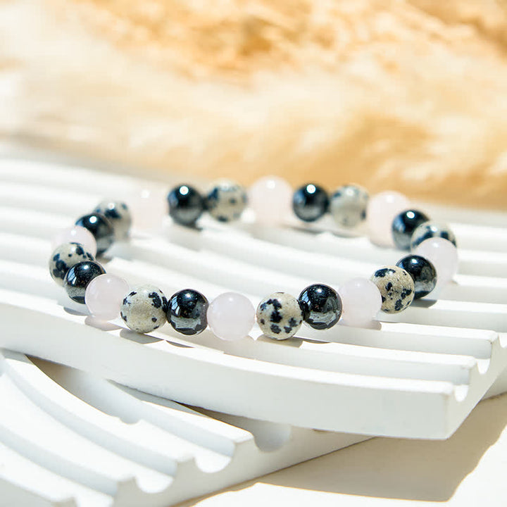 Bracciale Olivenorma in ematite, diaspro dalmata, quarzo rosa