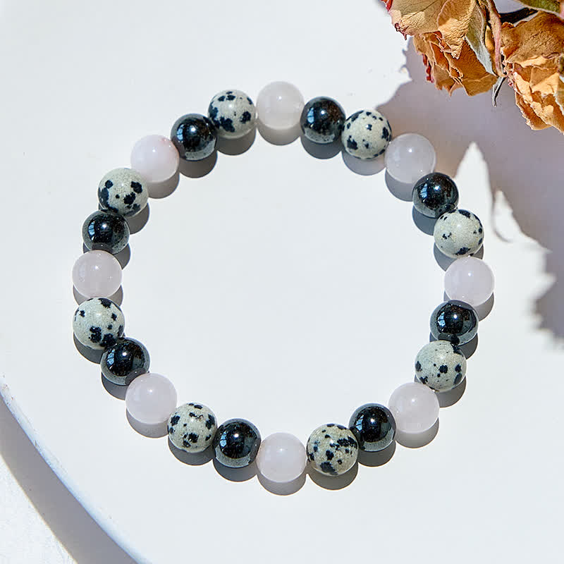 Bracciale Olivenorma in ematite, diaspro dalmata, quarzo rosa