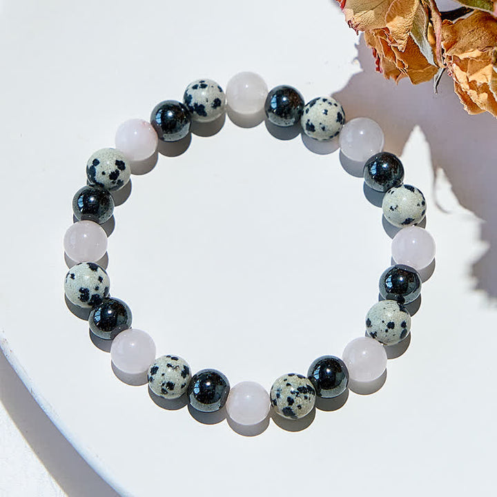 Bracciale Olivenorma in ematite, diaspro dalmata, quarzo rosa