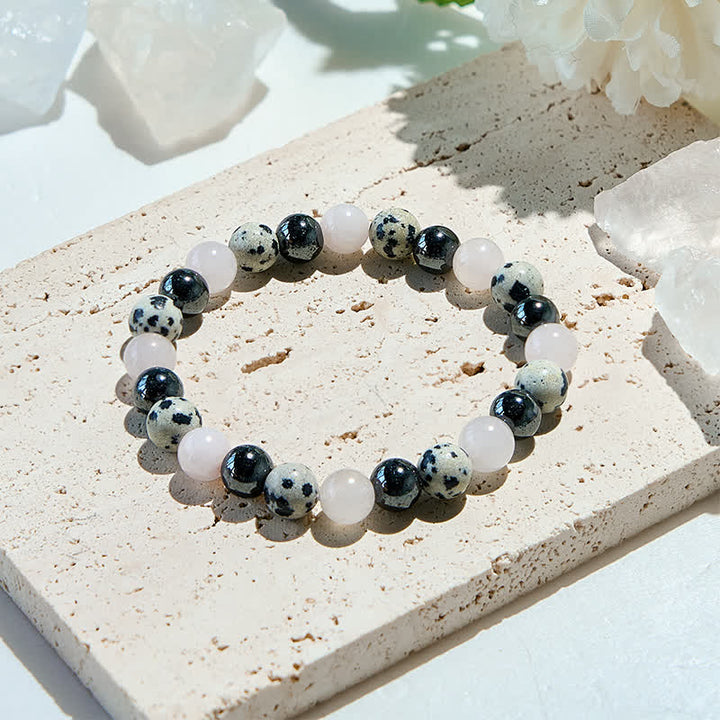Bracciale Olivenorma in ematite, diaspro dalmata, quarzo rosa