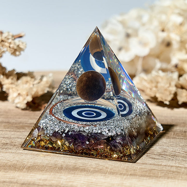 Simbolo del malocchio Olivenorma Piramide di orgone di ametista naturale