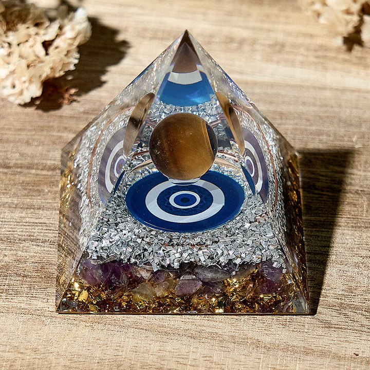 Simbolo del malocchio Olivenorma Piramide di orgone di ametista naturale