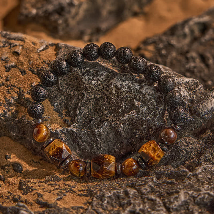 Bracciale Olivenorma con perline in pietra lavica sfaccettata con occhio di tigre 