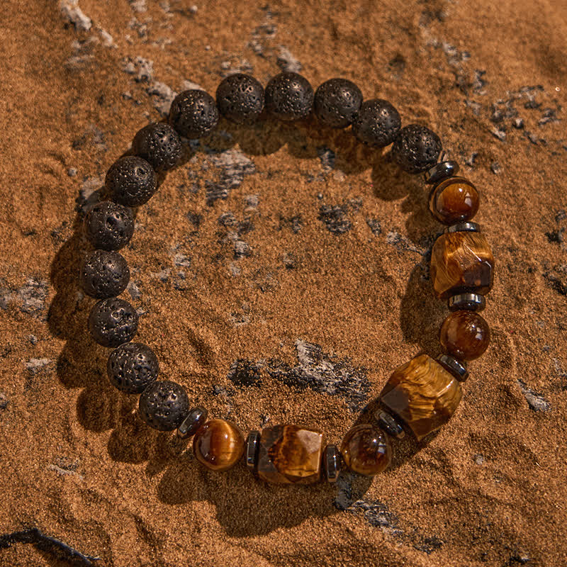 Bracciale Olivenorma con perline in pietra lavica sfaccettata con occhio di tigre 