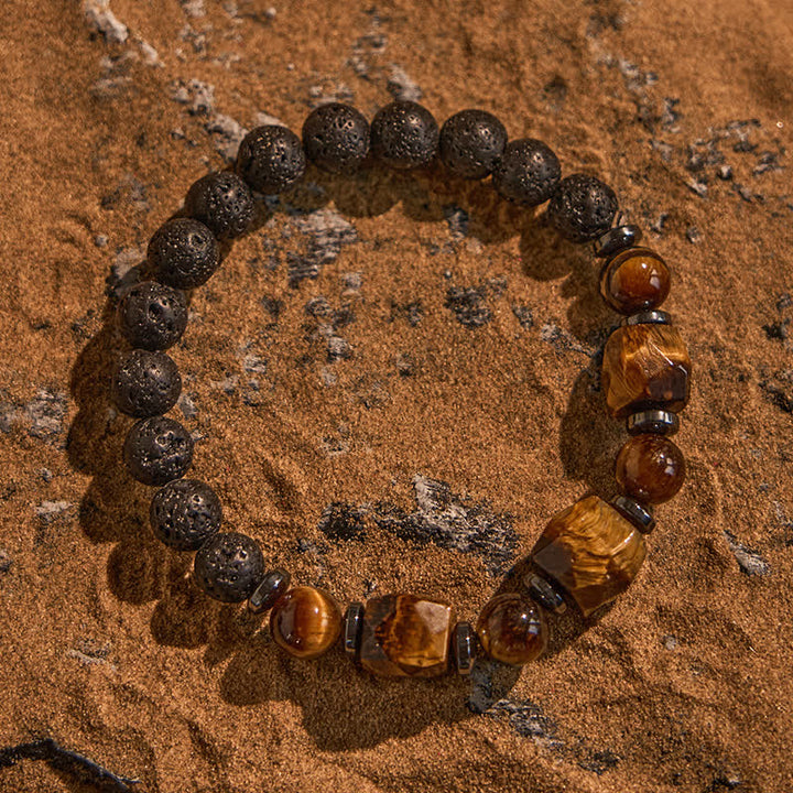 Bracciale Olivenorma con perline in pietra lavica sfaccettata con occhio di tigre 