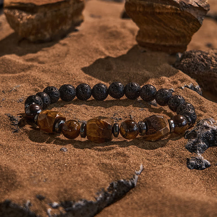 Bracciale Olivenorma con perline in pietra lavica sfaccettata con occhio di tigre 