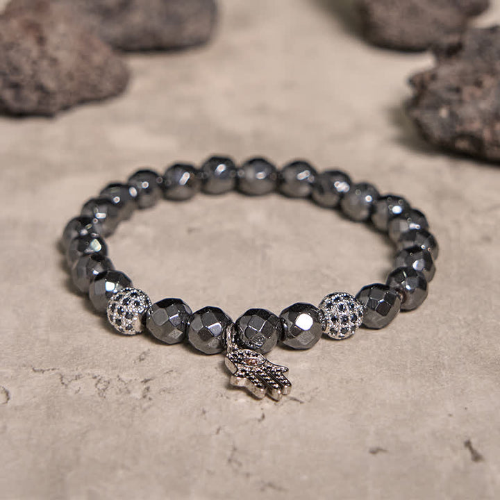 Olivenorma Bracciale con ciondolo Hamsa in perline di ematite