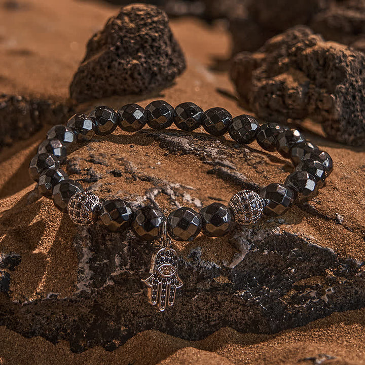 Olivenorma Bracciale con ciondolo Hamsa in perline di ematite