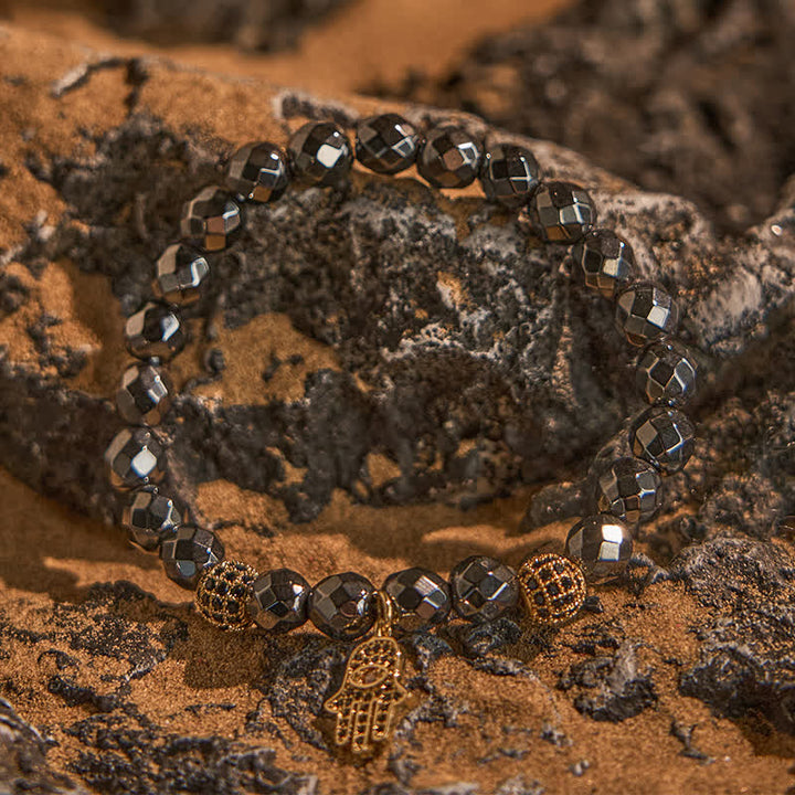 Olivenorma Bracciale con ciondolo Hamsa in perline di ematite