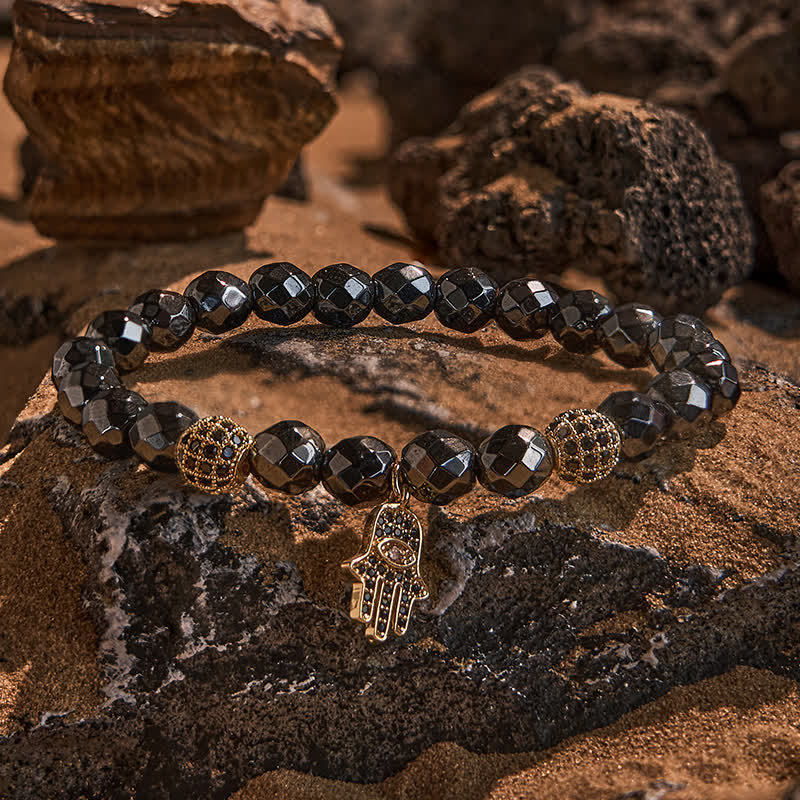 Olivenorma Bracciale con ciondolo Hamsa in perline di ematite