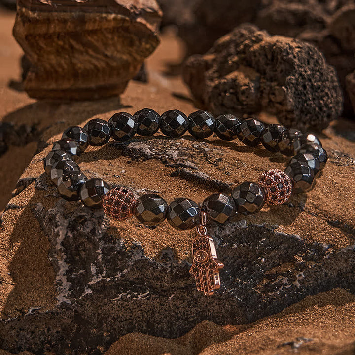 Olivenorma Bracciale con ciondolo Hamsa in perline di ematite