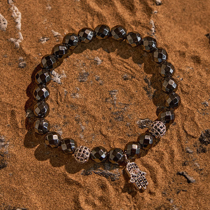 Olivenorma Bracciale con ciondolo Hamsa in perline di ematite