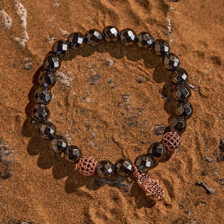 Olivenorma Bracciale con ciondolo Hamsa in perline di ematite