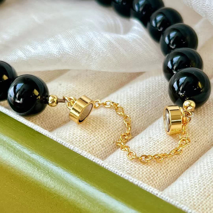 Bracciale magnetico in perle di ossidiana naturale Olivenorma 