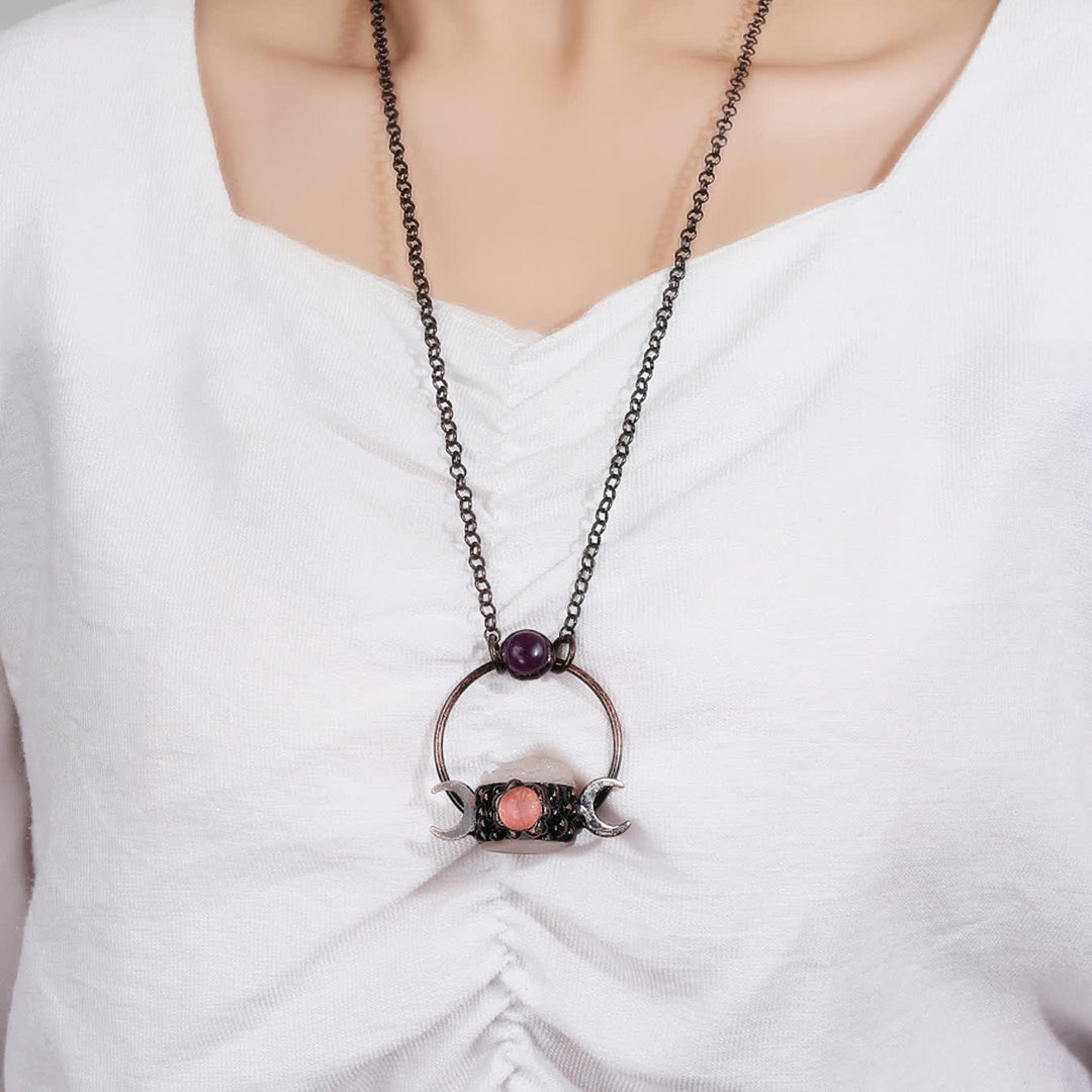 Collana Olivenorma con ciondolo a doppia luna in metallo e quarzo trasparente