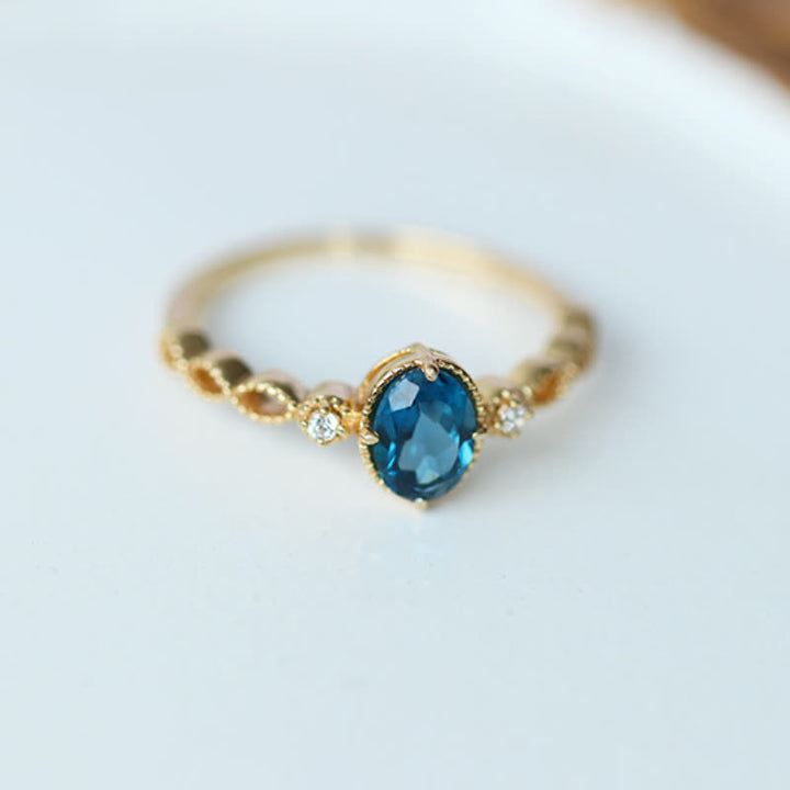 Anello vintage con topazio blu ovale Olivenorma