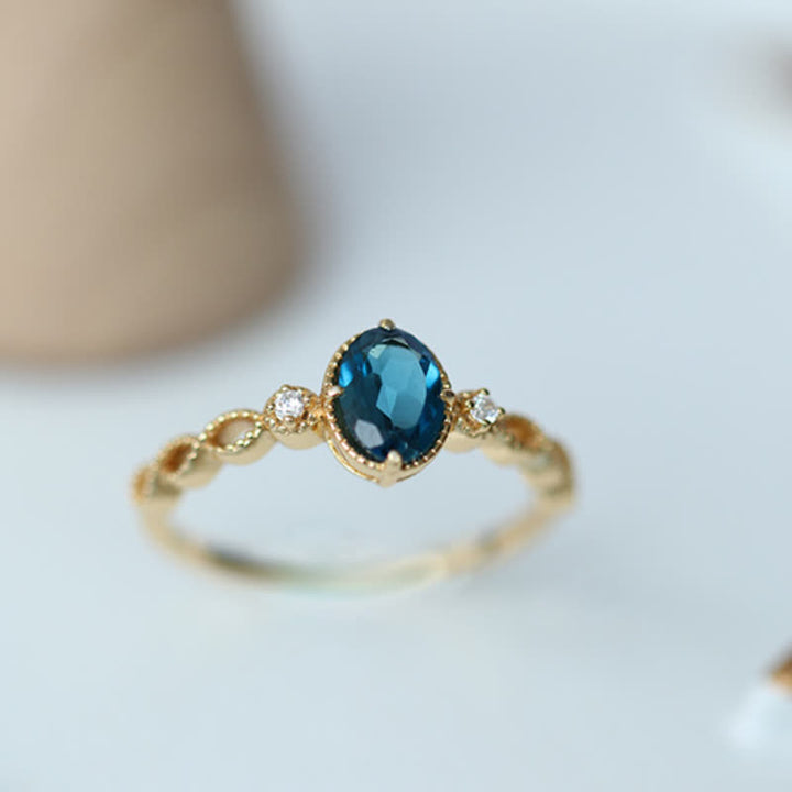 Anello vintage con topazio blu ovale Olivenorma