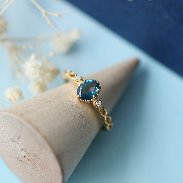 Anello vintage con topazio blu ovale Olivenorma