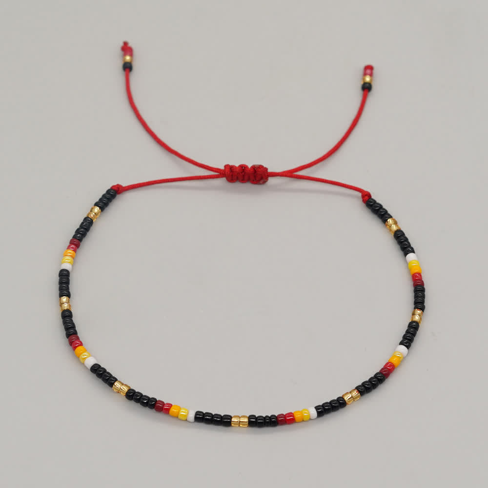 Olivenorma Braccialetto regolabile con perline di riso colorate 