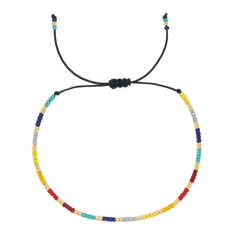 Olivenorma Braccialetto regolabile con perline di riso colorate 