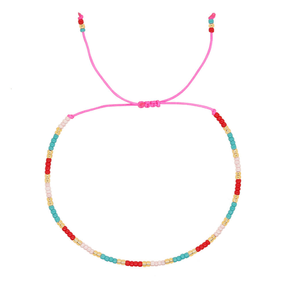 Olivenorma Braccialetto regolabile con perline di riso colorate 