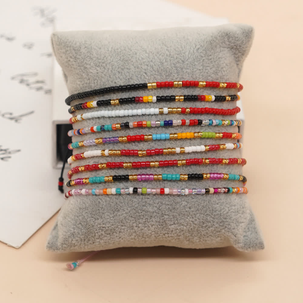 Olivenorma Braccialetto regolabile con perline di riso colorate 