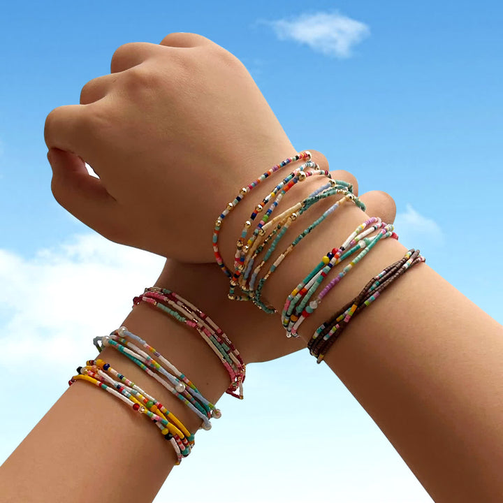 Olivenorma Braccialetto multistrato con perline di riso colorate 