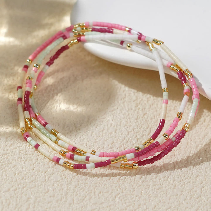 Olivenorma Braccialetto multistrato con perline di riso colorate 