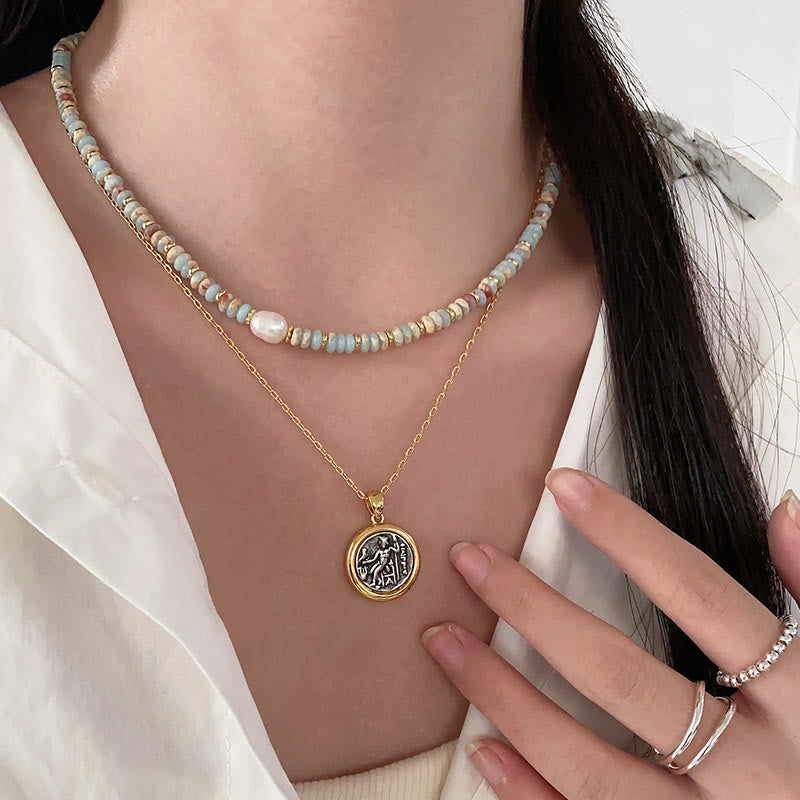 Collana di perline impilate in pietra blu dell'imperatore Olivenorma