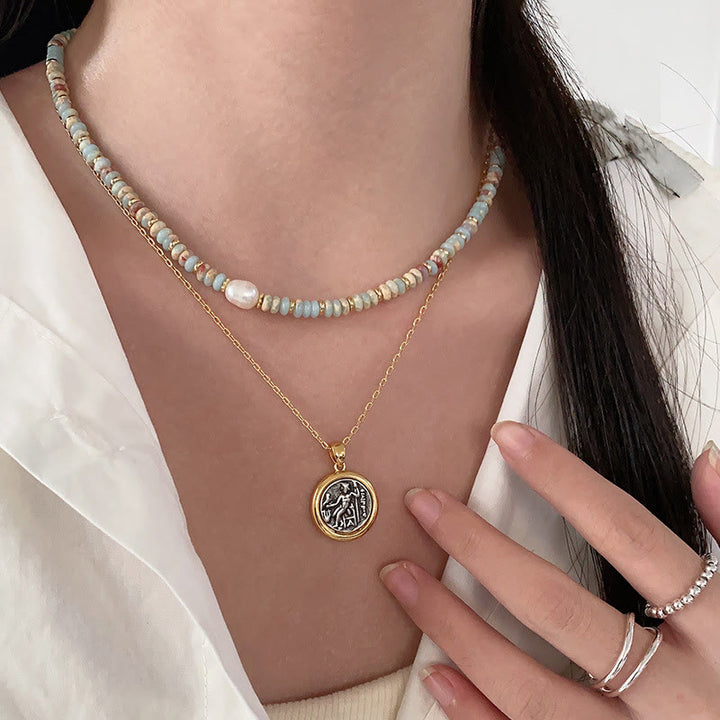 Collana di perline impilate in pietra blu dell'imperatore Olivenorma