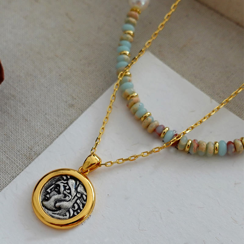 Collana di perline impilate in pietra blu dell'imperatore Olivenorma