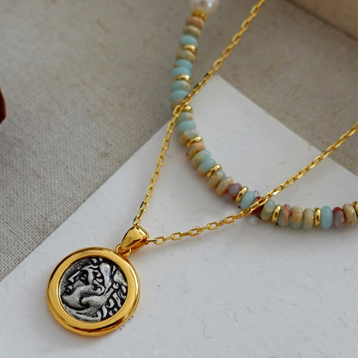 Collana di perline impilate in pietra blu dell'imperatore Olivenorma