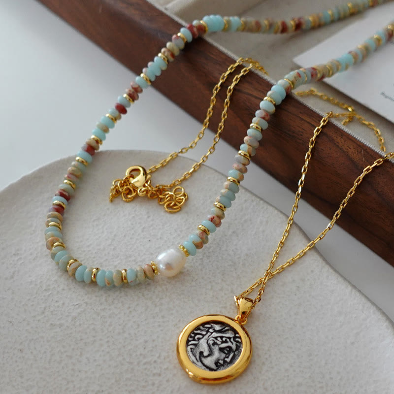 Collana di perline impilate in pietra blu dell'imperatore Olivenorma