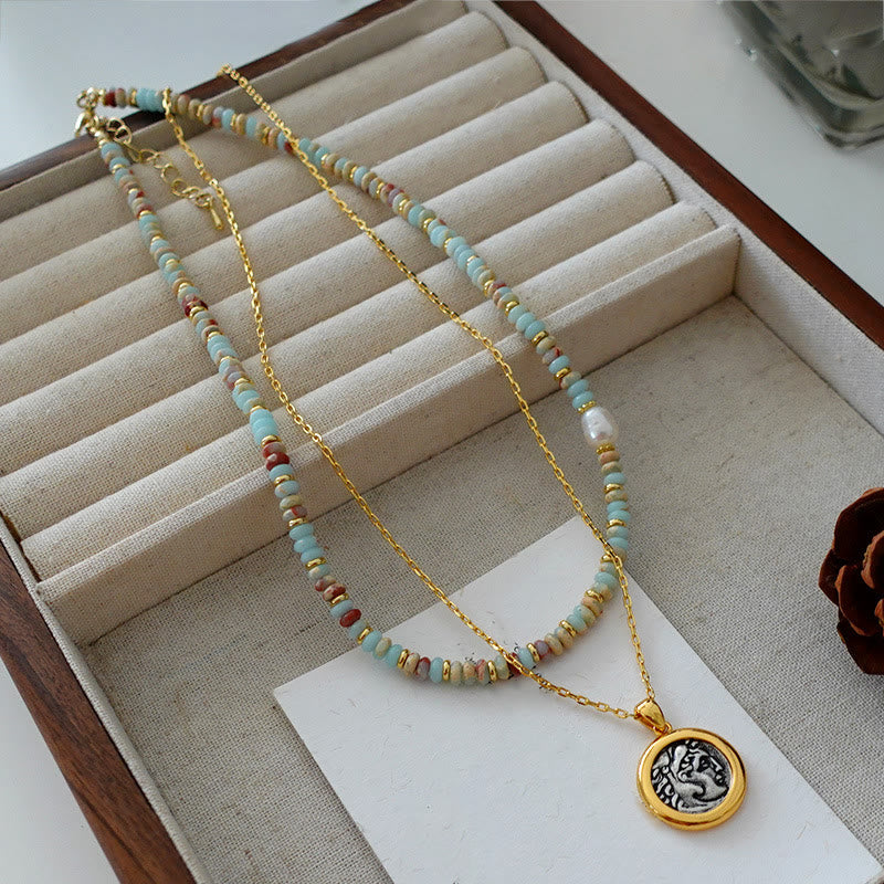 Collana di perline impilate in pietra blu dell'imperatore Olivenorma