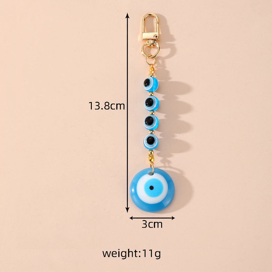 Olivenorma Portachiavi in resina con occhio malvagio fatto a mano