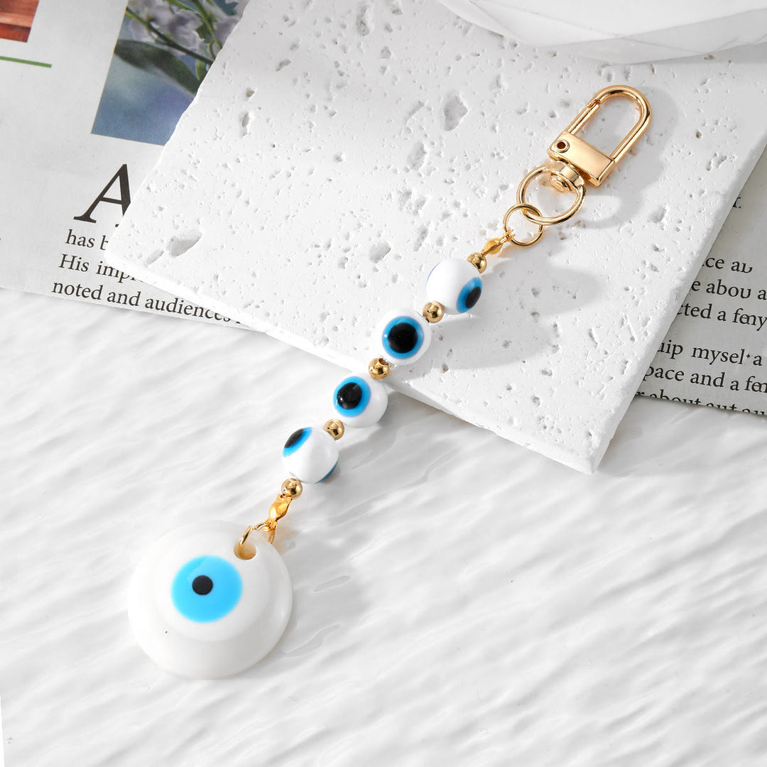 Olivenorma Portachiavi in resina con occhio malvagio fatto a mano